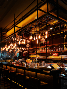 inside of a bar with moody lighting 