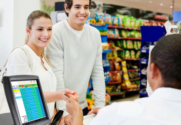 a man and woman checking out at a convenience store