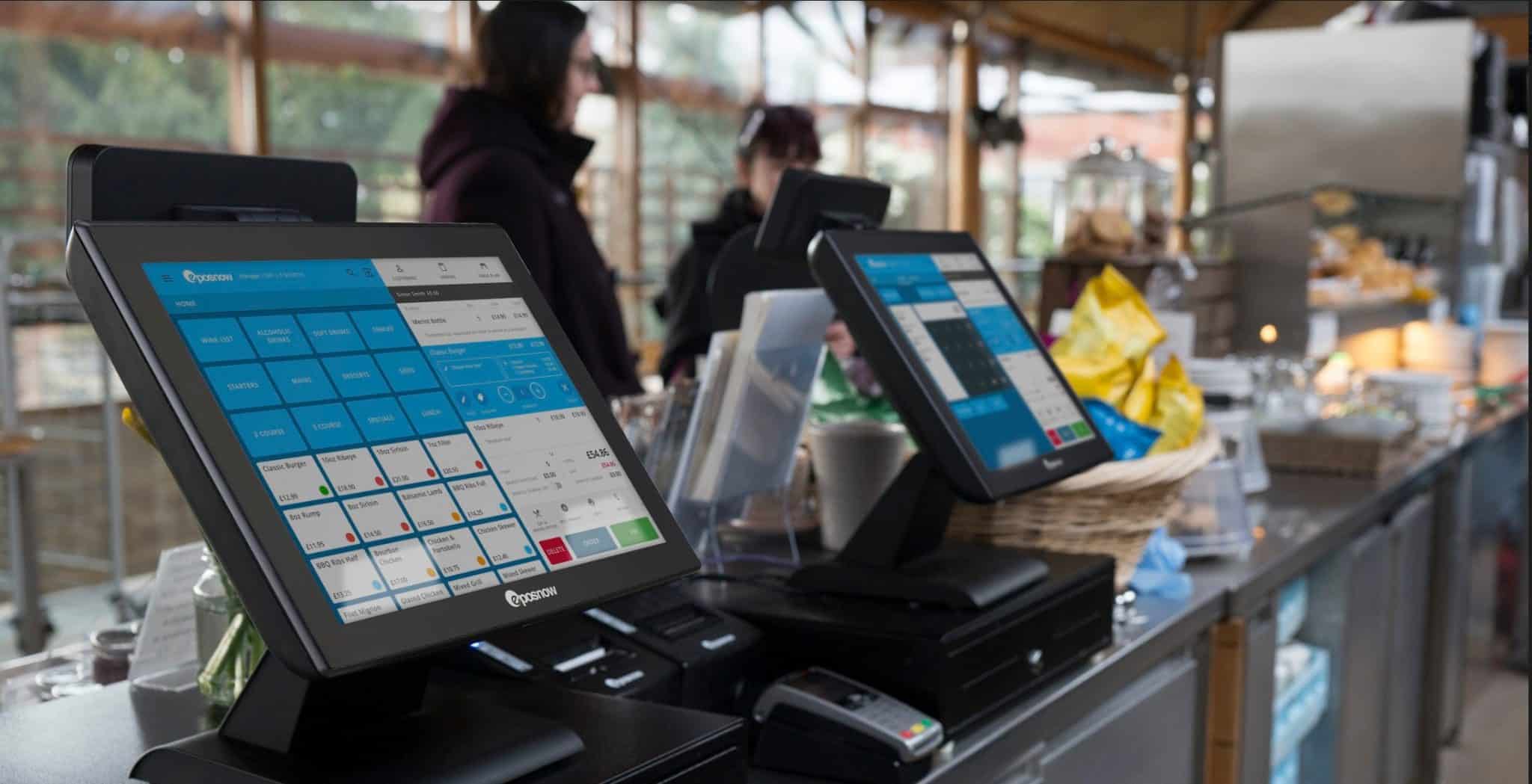 Epos Now terminal stands set up inside of a restaurant 