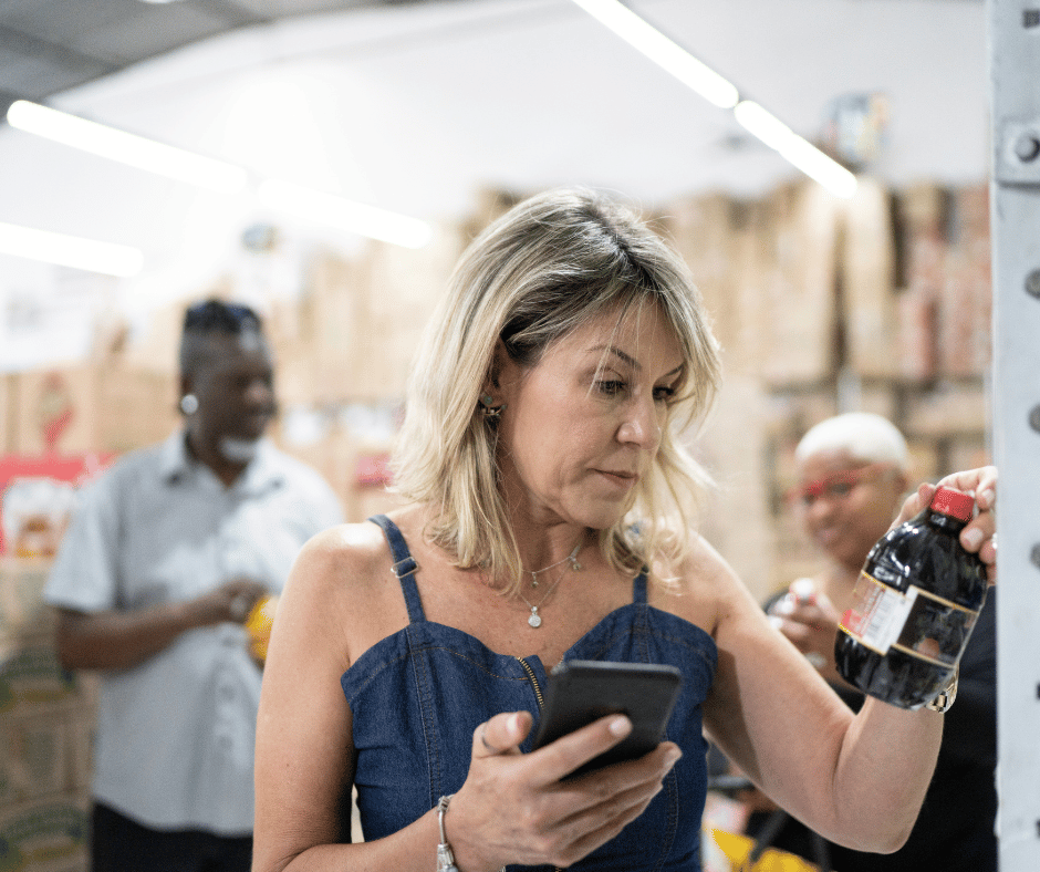 a woman inside of a wholesale warehouse looking at products