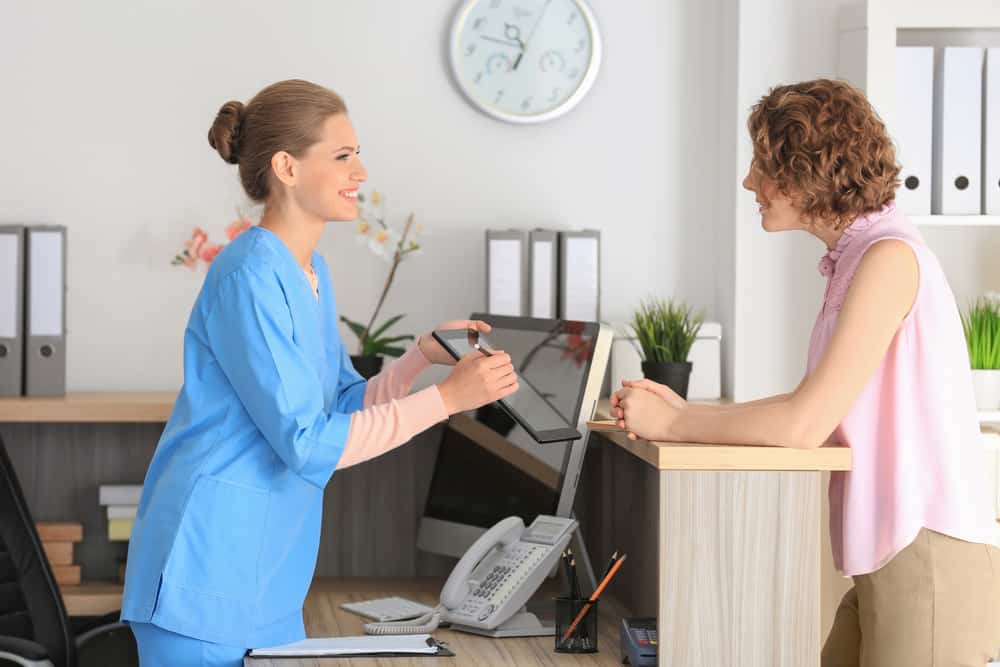 Person making a payment at a doctors office