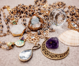 a photo of an array of jewelry displayed mainly gold themed