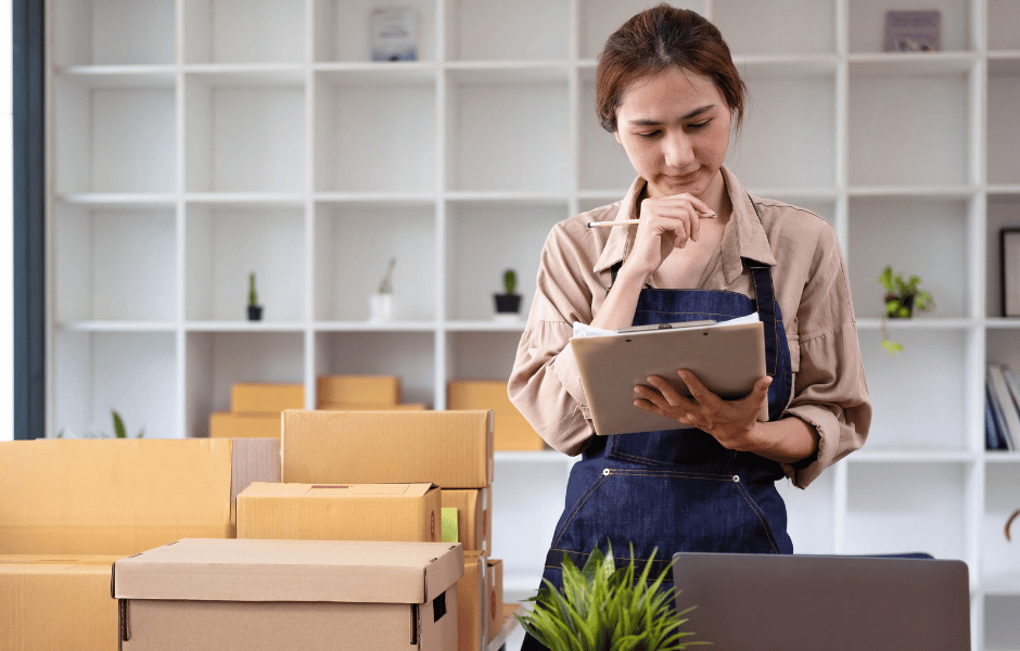 a female business owner overseeing inventory 