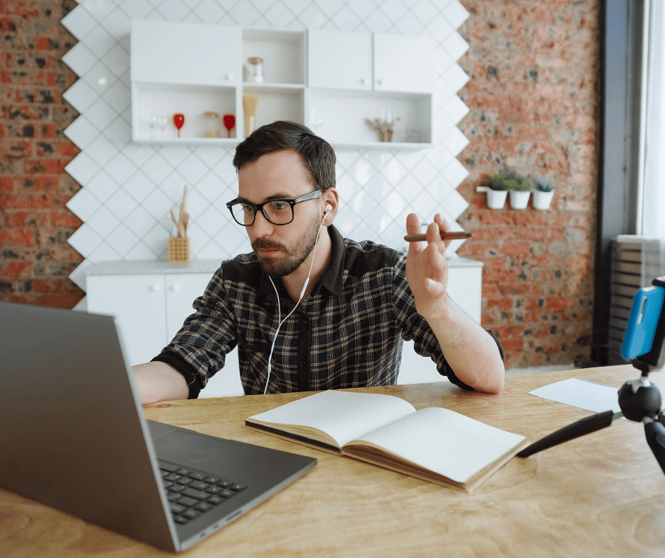 a man working from home creating his own online courses